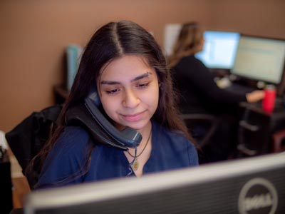 the front office team at Elite Dental helping to schedule patients