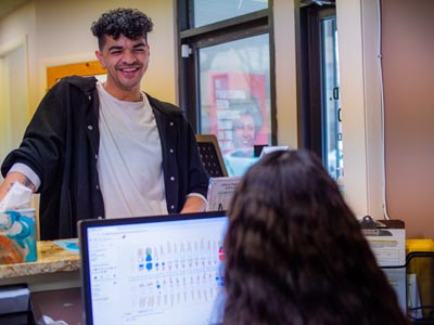 patient scheduling their next dental appointment at Elite Dental in Chicago, IL