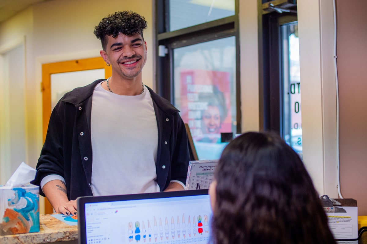 patient scheduling their next dental appointment at Elite Dental in Chicago, IL