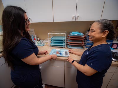 the Elite Dental team preparing tools for patient care