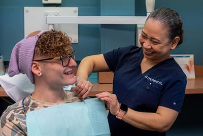 patient receiving periodontal therapy at Elite Dental in Chicago, IL